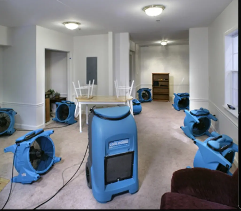 Air movers and dehumidifier setup for Water Extraction & Removal in Guilford